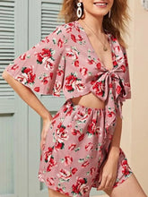 Load image into Gallery viewer, Women's Bat Sleeve Deep V-neck Bow Tie Floral Shorts Jumpsuit