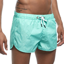 Load image into Gallery viewer, Home beach slim three-quarter split sports shorts