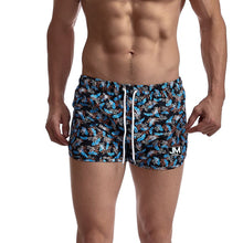Load image into Gallery viewer, Camouflage print beach three-quarter pants sports shorts